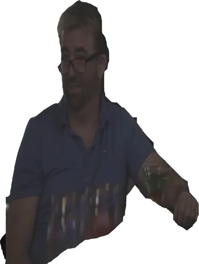 Mike in glasses, drink in hand